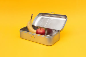 Open fridge lunch box with an apple and banana inside