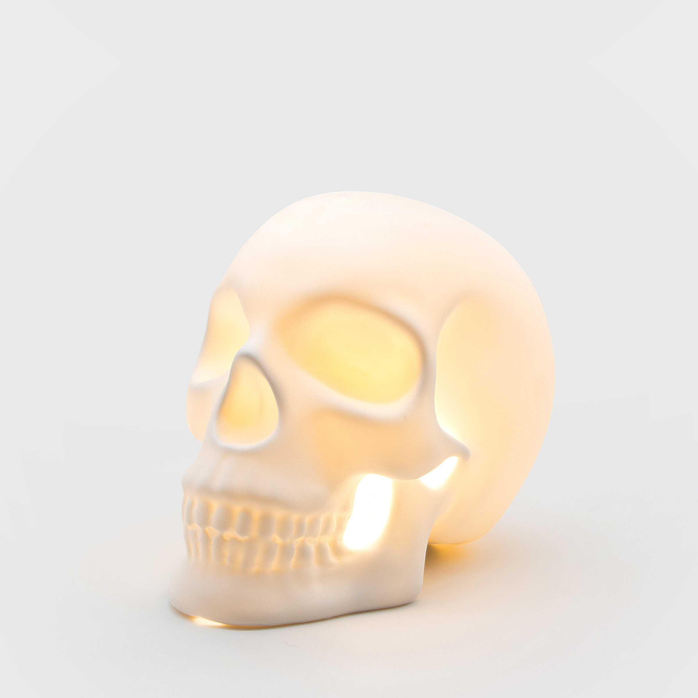 Decorative skull shaped lamp made from ceramic